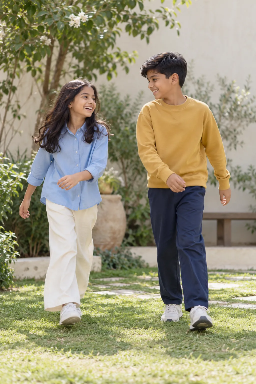 Two children in age-appropriate everyday clothing playing outdoors. AI campaign concept.